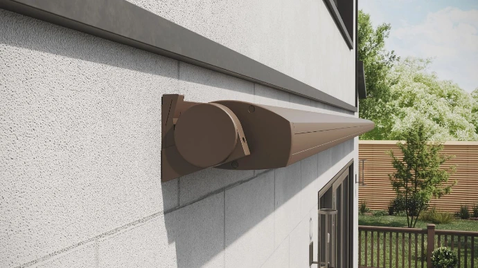 Retracted awning enclosed in wall-mounted protective cassette housing